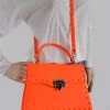 Curvaceous Boutique Neon Orange Studded Clutch / Review Covid-19 Policy 1 Curvaceous Boutique Neon Orange Studded Clutch / Review Covid-19 Policy