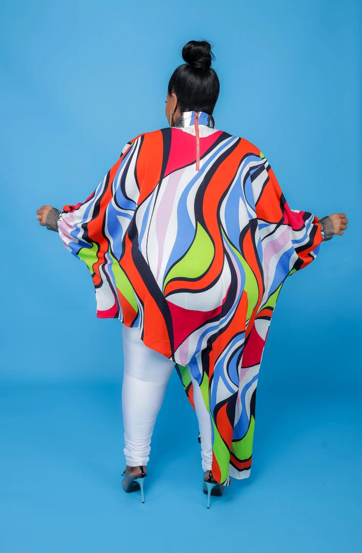 Curvaceous Boutique Orange Print Chiffon Asymmetric Top 4 Curvaceous Boutique Orange Print Chiffon Asymmetric Top