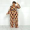 Curvaceous Boutique NEW CoCo Orange Print Jumpsuit